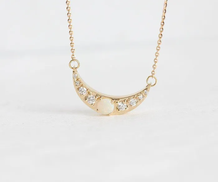 Gold Crescent Moon Necklace with Opal and Side Diamonds Capucinne Necklaces