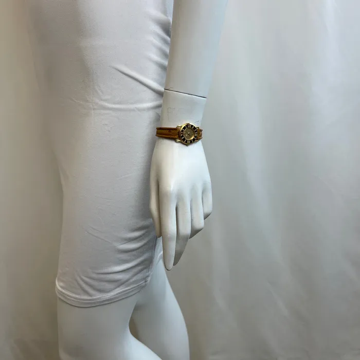 PreStyled Sets Corum Corum 18K Gold Watch with Roman Numerals and Tan Ostrich Strap